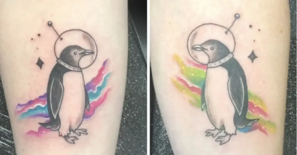 space themed penguin couple tattoo