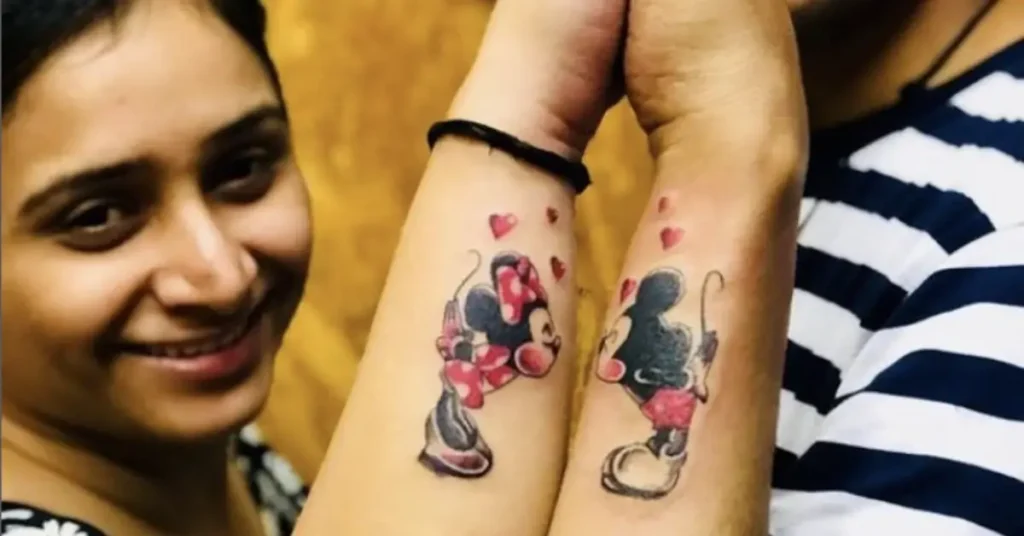 kissing Micky Mouse disney couple tattoos with hearts