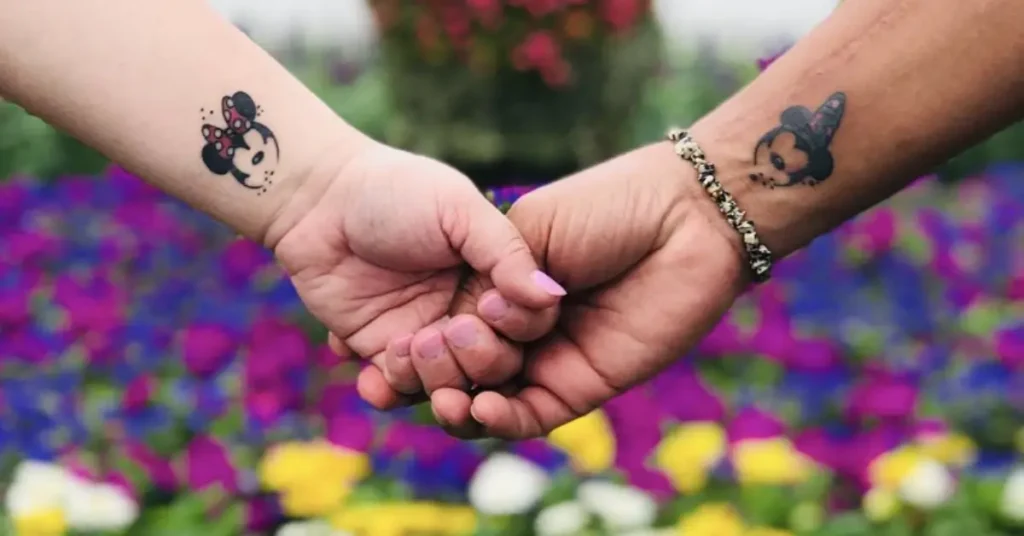 Micky Mouse themed disney couple tattoos